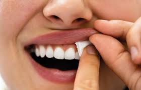 place it comfortably under your top lip